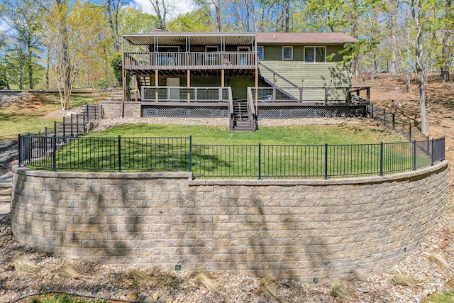 rear view of property with a yard, a fenced backyard, stairway, and a deck