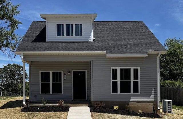 2236 Kenwood Blvd SE, Roanoke, VA 24013 - view of front of property with fence, central air condition unit, and a shingled roof