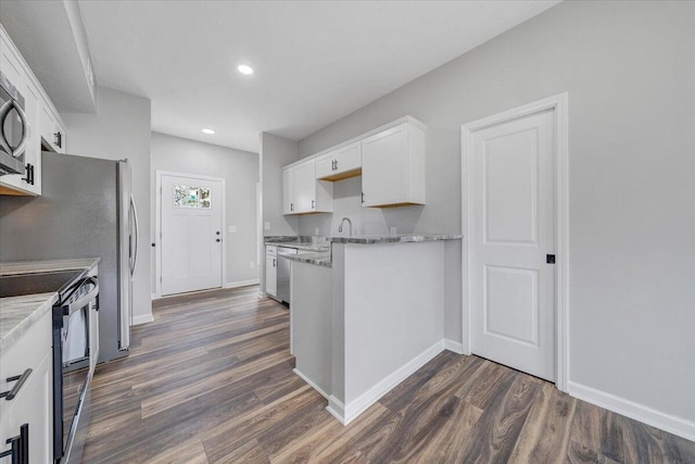 2236 Kenwood Blvd SE, Roanoke, VA 24013 - kitchen with black electric range oven, dishwasher, white cabinets, dark wood-style flooring, and recessed lighting