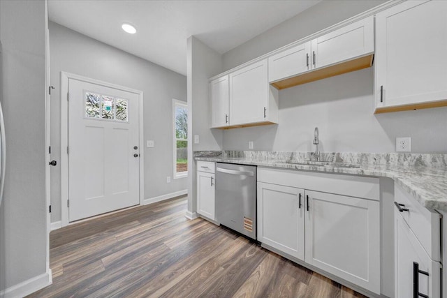 2236 Kenwood Blvd SE, Roanoke, VA 24013 - kitchen featuring stainless steel dishwasher, a sink, wood finished floors, white cabinetry, and recessed lighting