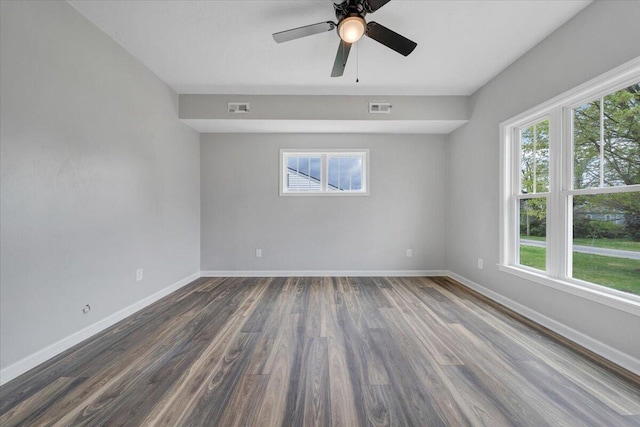 2236 Kenwood Blvd SE, Roanoke, VA 24013 - empty room with dark wood-type flooring, baseboards, and ceiling fan