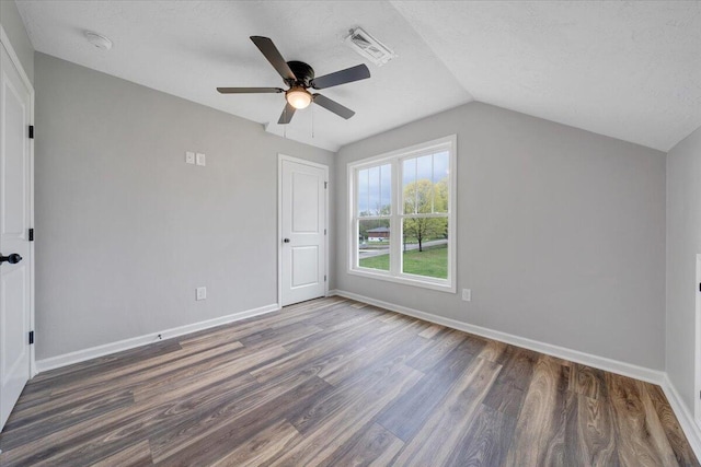 2236 Kenwood Blvd SE, Roanoke, VA 24013 - additional living space with wood finished floors, vaulted ceiling, a ceiling fan, baseboards, and a textured ceiling