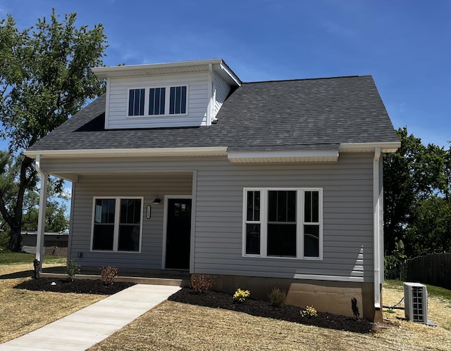 2236 Kenwood Blvd SE, Roanoke, VA 24013 - view of front of home featuring covered porch, central air condition unit, and a shingled roof