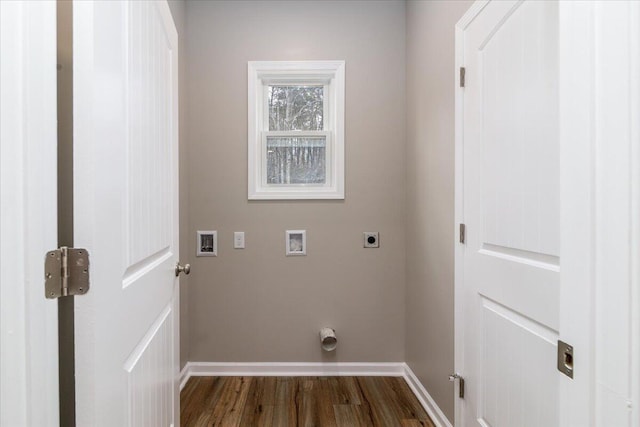 clothes washing area featuring laundry area, baseboards, dark wood-type flooring, hookup for an electric dryer, and washer hookup