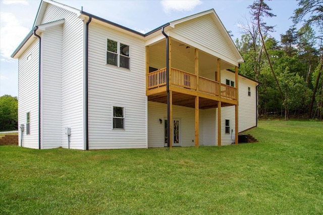 back of property featuring a yard and cooling unit
