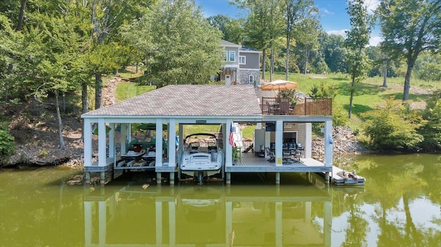 dock area featuring a water view and boat lift