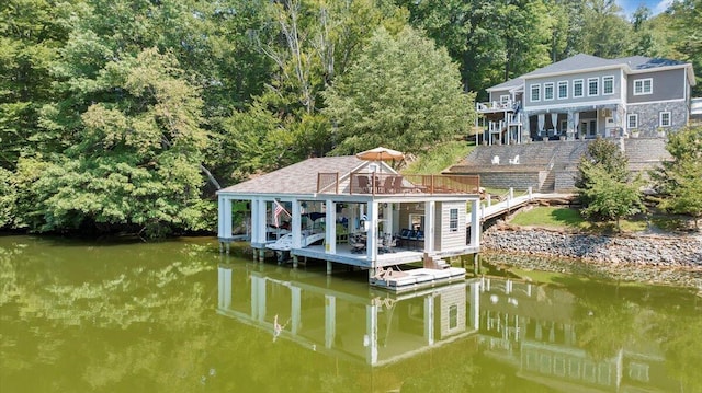 view of dock with a water view and boat lift