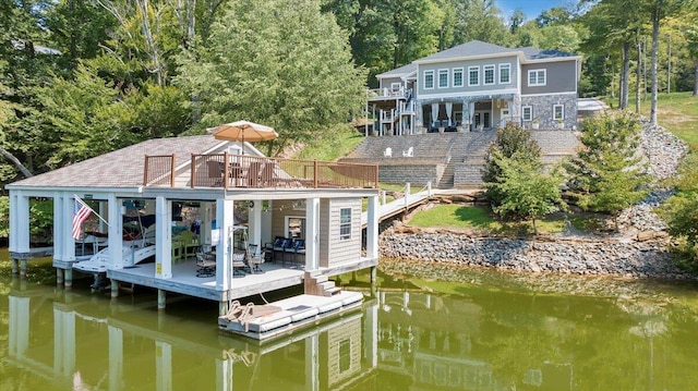 dock area with a deck with water view