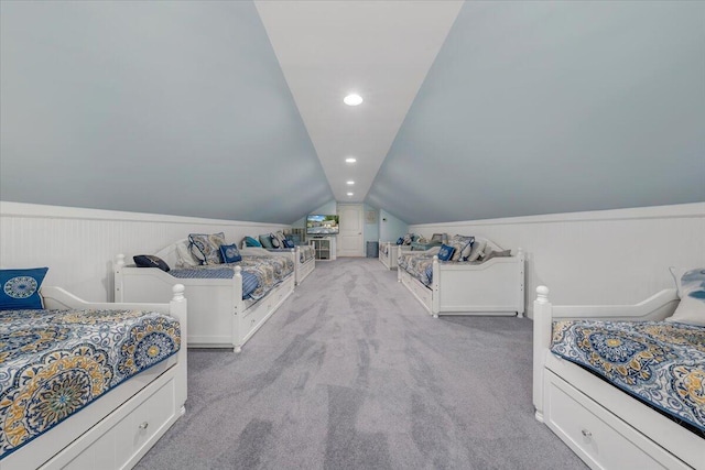 bedroom with lofted ceiling, light carpet, and recessed lighting