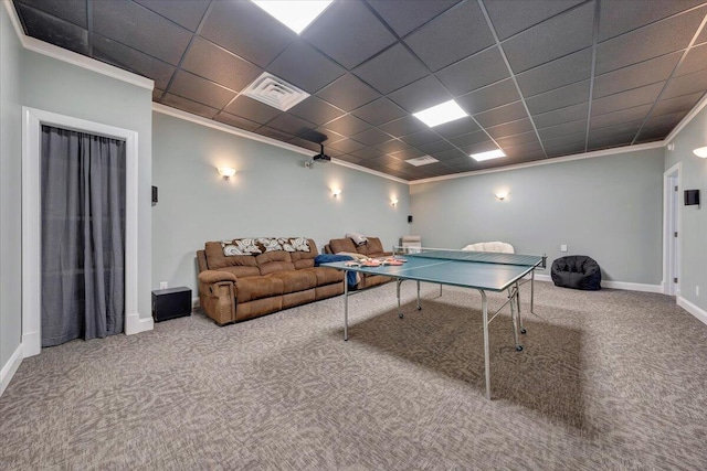 playroom with carpet floors, baseboards, visible vents, and crown molding