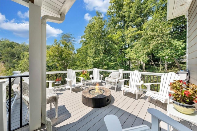 deck with an outdoor fire pit