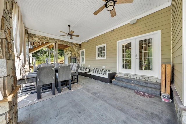 view of patio with outdoor lounge area, outdoor dining space, ceiling fan, and french doors