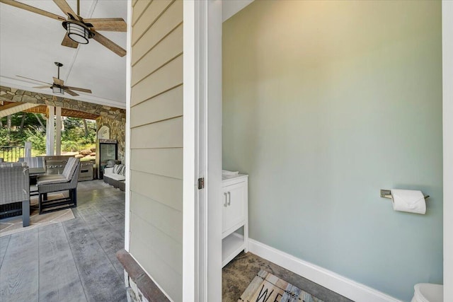 interior space with a patio, outdoor dining area, and a ceiling fan