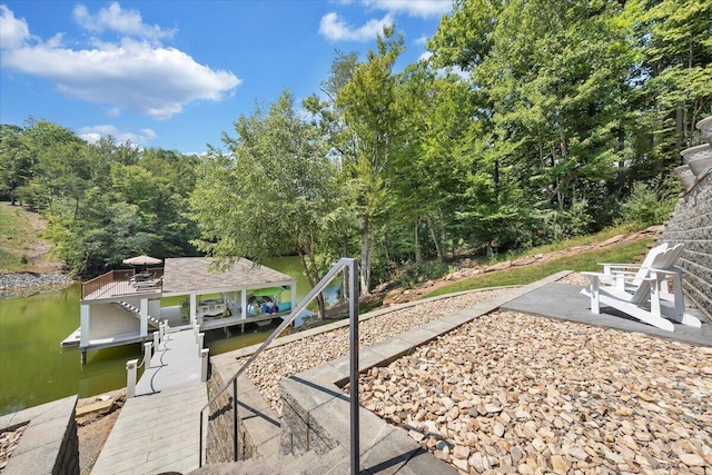 dock area with a water view