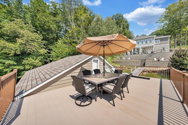 wooden deck with outdoor dining space