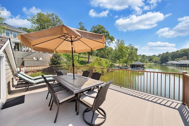 view of patio / terrace featuring a deck with water view