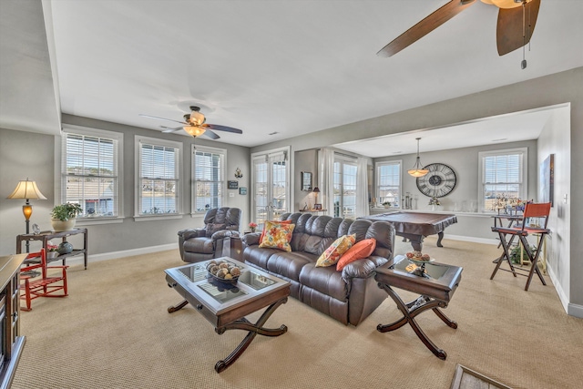 living area featuring carpet floors, ceiling fan, baseboards, and pool table