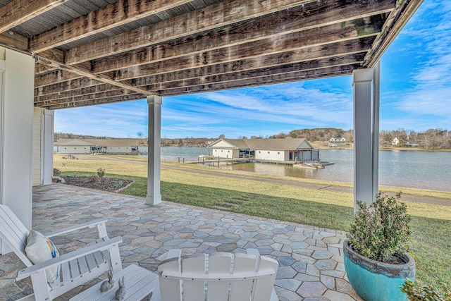 view of patio with a water view