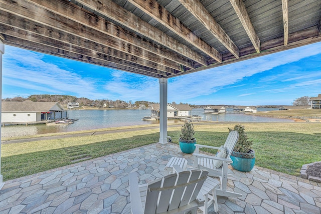 view of patio / terrace with a water view