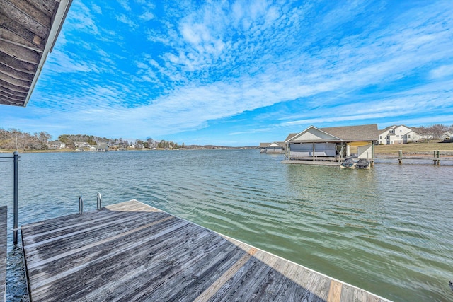 dock area with a water view