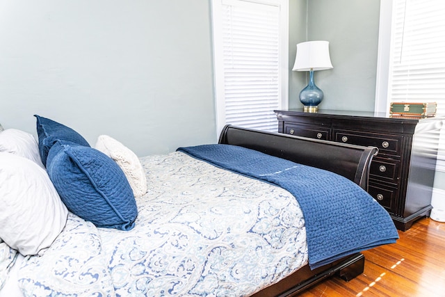 bedroom featuring wood finished floors