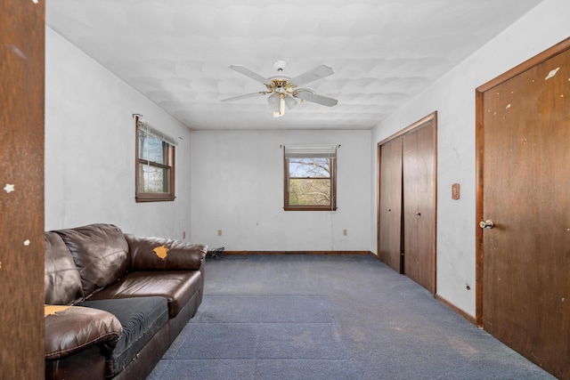 42 Keswick Ct, Troutville, VA 24175 - living room with ceiling fan, a wealth of natural light, baseboards, and carpet