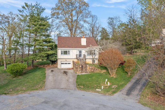 42 Keswick Ct, Troutville, VA 24175 - view of front facade featuring a chimney, driveway, stone siding, a front yard, and a garage