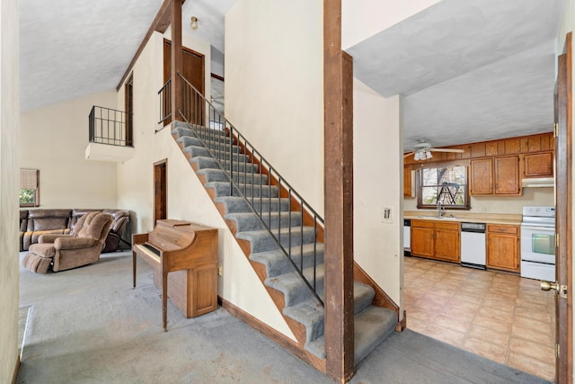 42 Keswick Ct, Troutville, VA 24175 - stairway featuring lofted ceiling, carpet floors, and a ceiling fan