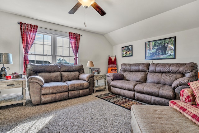 living area with carpet, vaulted ceiling, and a ceiling fan