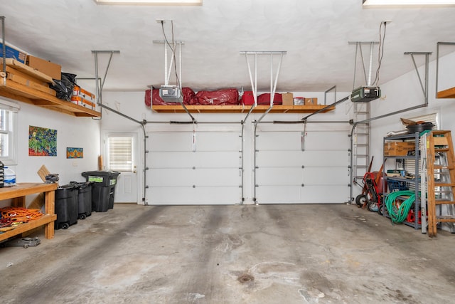 garage featuring a garage door opener