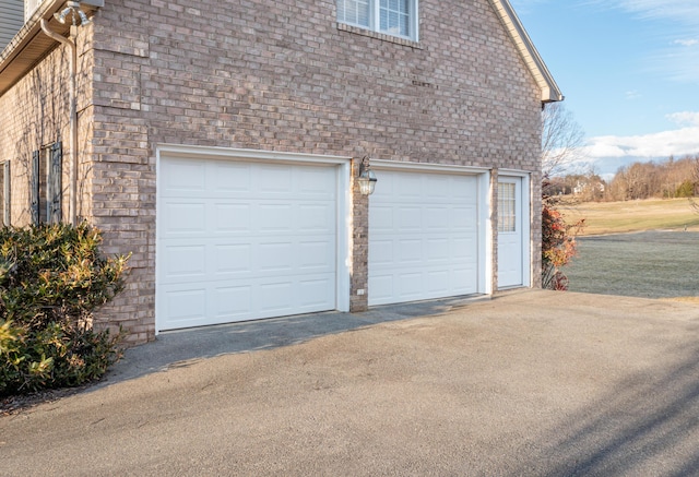 garage with driveway