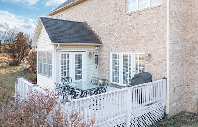 wooden deck with area for grilling