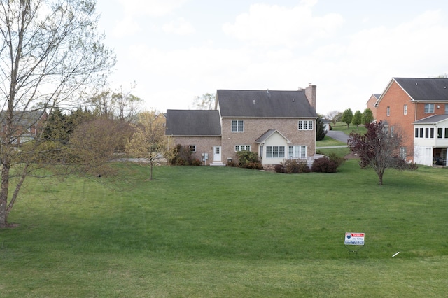 56 Savannah Ct, Daleville, VA 24083 - rear view of property with a lawn and a chimney