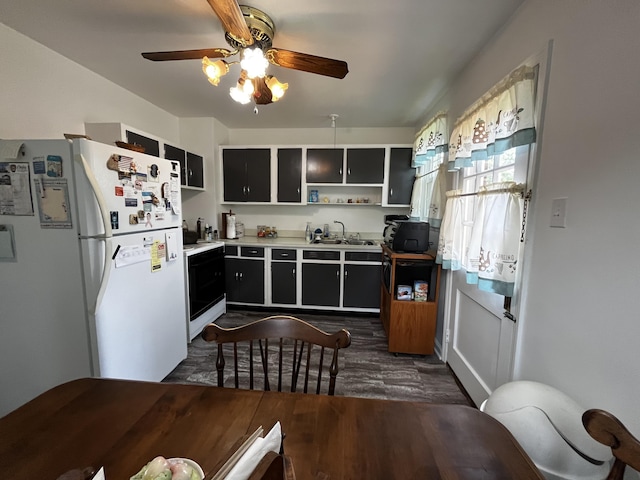 23 Upland Dr, Salem, VA 24153 - kitchen with freestanding refrigerator, a sink, electric range, dark wood-type flooring, and a ceiling fan