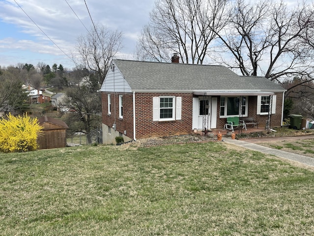 23 Upland Dr, Salem, VA 24153 - view of front of property featuring a chimney, brick siding, a front lawn, and a shingled roof