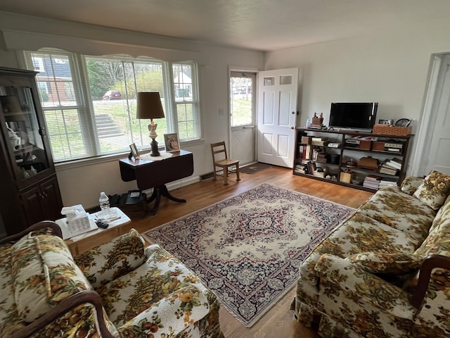 23 Upland Dr, Salem, VA 24153 - living area featuring healthy amount of natural light and wood finished floors