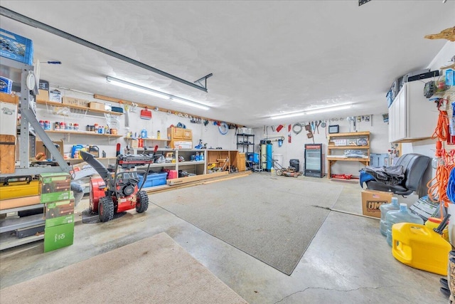 garage with a workshop area