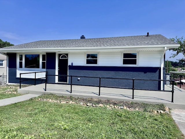 418 Victor Ave NE, Roanoke, VA 24012 - single story home with brick siding, a front lawn, covered porch, and roof with shingles