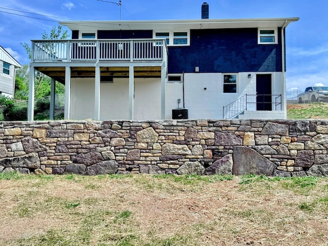 418 Victor Ave NE, Roanoke, VA 24012 - back of property with a wooden deck, a chimney, and central AC unit