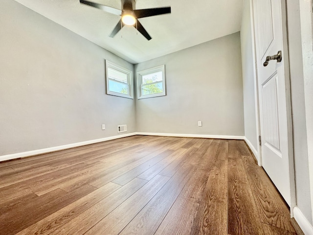 418 Victor Ave NE, Roanoke, VA 24012 - unfurnished bedroom featuring hardwood / wood-style flooring and ceiling fan