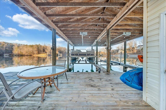 view of dock featuring a water view and boat lift