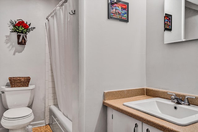 bathroom with shower / bath combination with curtain, vanity, and toilet