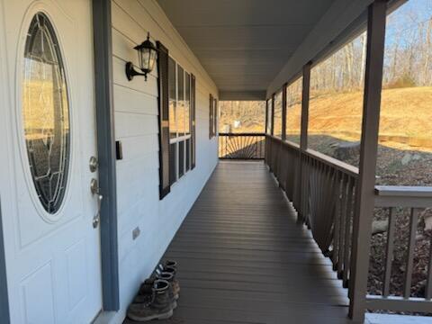 deck featuring covered porch