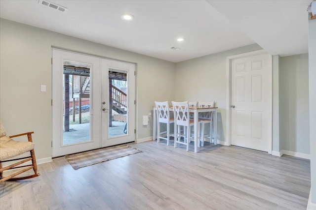 entryway with baseboards, visible vents, wood finished floors, french doors, and recessed lighting