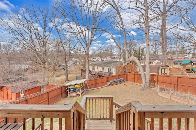 view of yard featuring an outbuilding and a fenced backyard