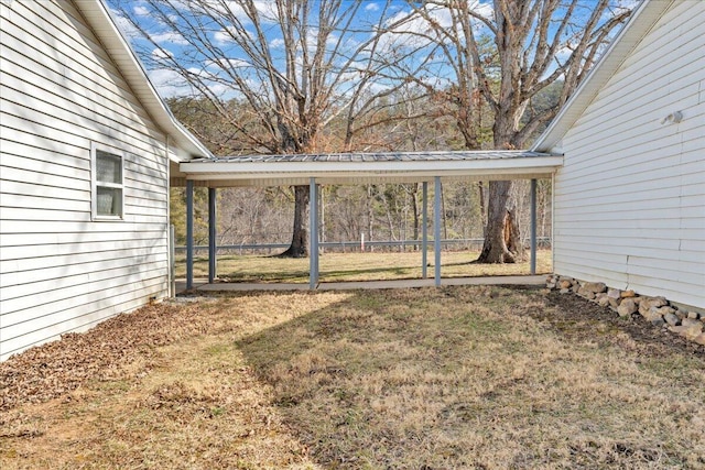 view of yard with a carport