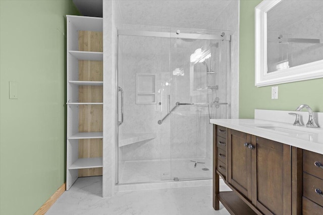 full bath featuring vanity and a stall shower