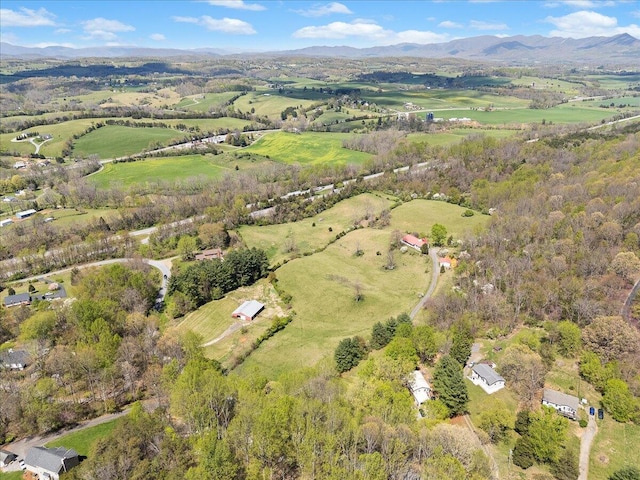 drone / aerial view featuring a mountain view