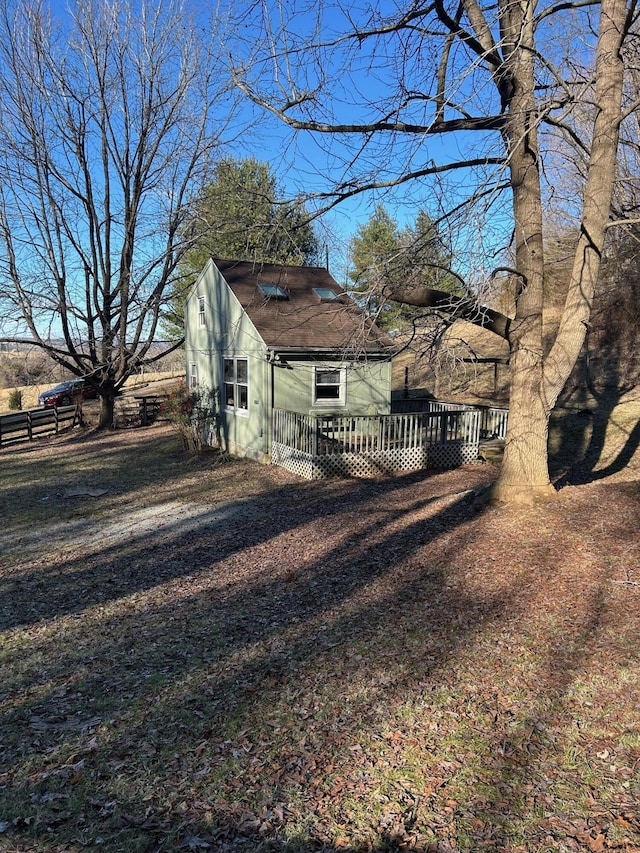 view of yard with a deck