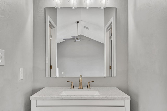 bathroom featuring vanity, visible vents, and ceiling fan